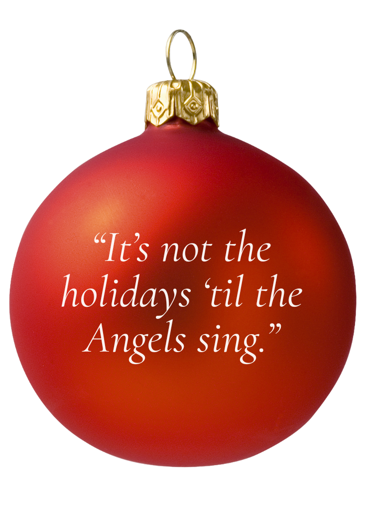 Red Christmas ornament with gold top and white text on a white background