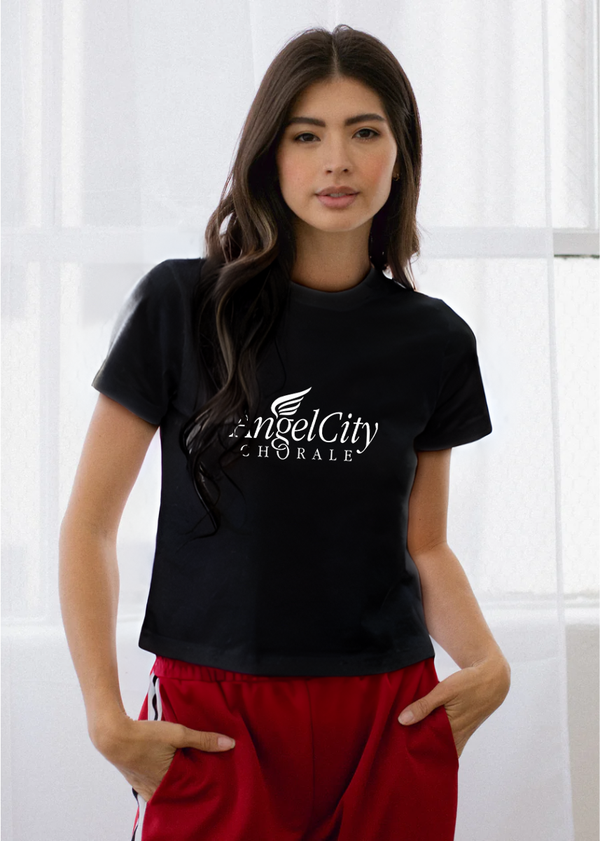 Woman wearing a black t-shirt with 'Angel City Chorale' logo against a white background